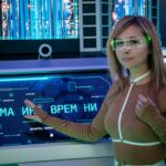 A woman interacts with a futuristic touchscreen display in a technology-themed environment.
